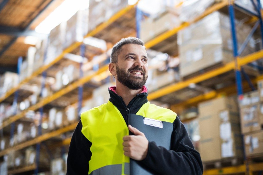 Warehouse worker wearing safety vest