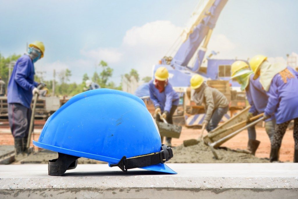 blue safety hat in the constructon site