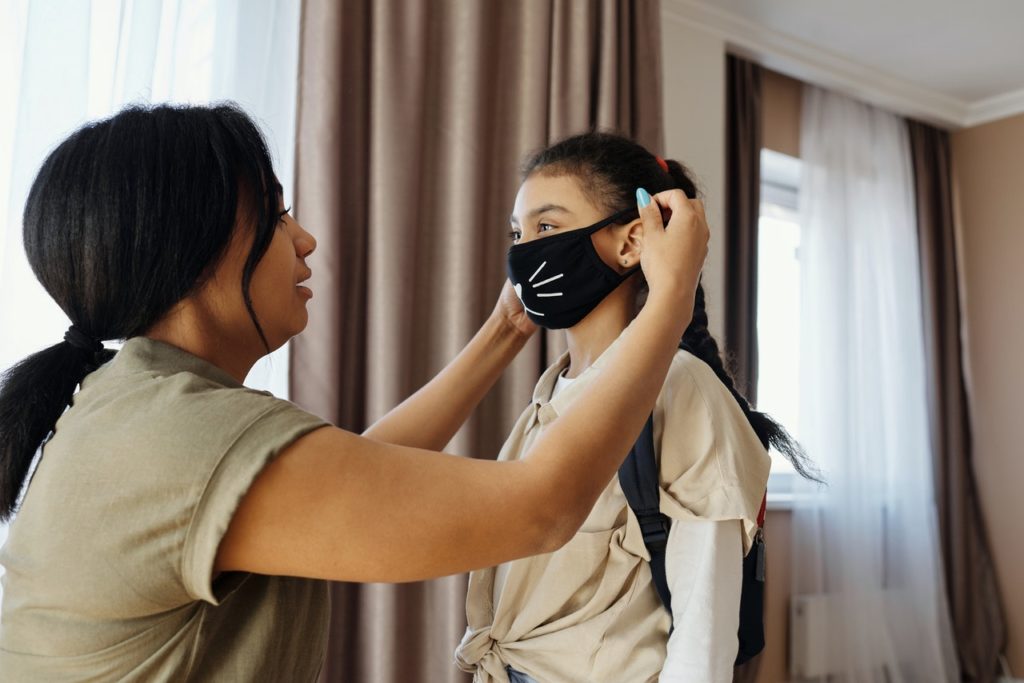 child wearing face mask