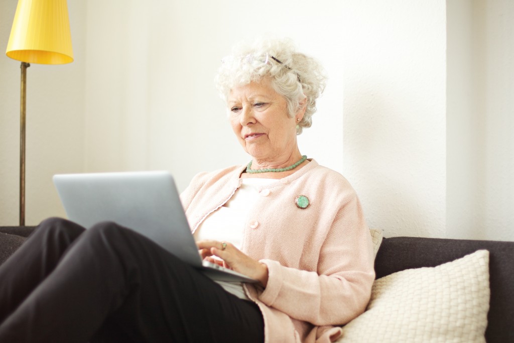 senior woman using laptop