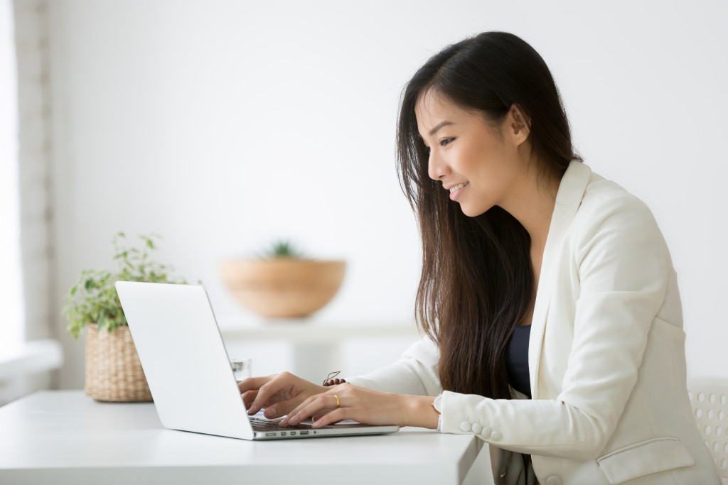 female entrepreneur on her laptop